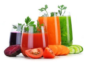 Glasses with fresh vegetable juices isolated on white. Detox diet.